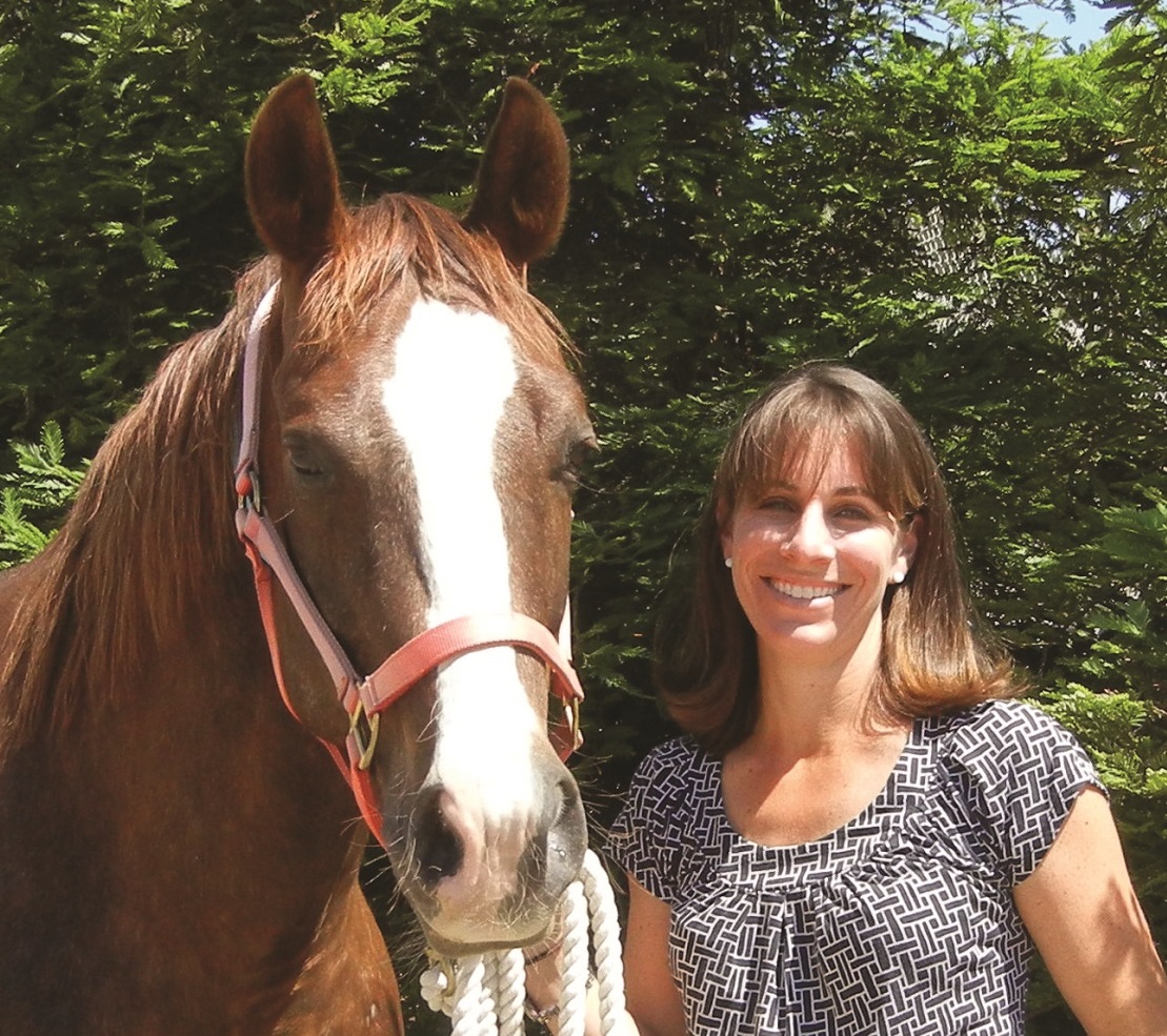 CEH director Dr. Carrie Finno with horse